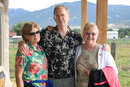 Merry , Bob, & Sue in front of the straw bail house